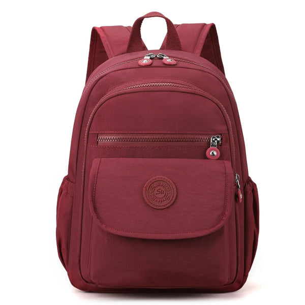 Ladies' lightweight, large capacity stylish black commuter travel backpack with adjustable shoulder straps, school and leisure b